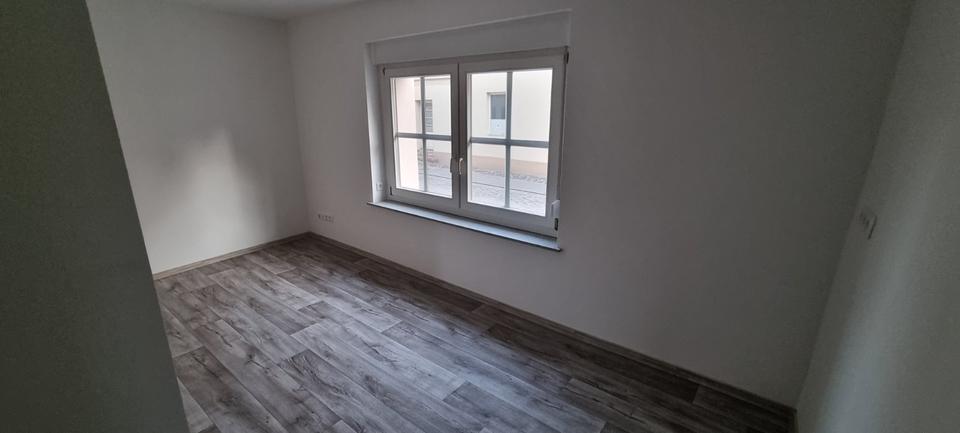 Erdgeschosswohnung mit Innenhof + Fußbodenheizung im Stadtzentrum 2 zimmer